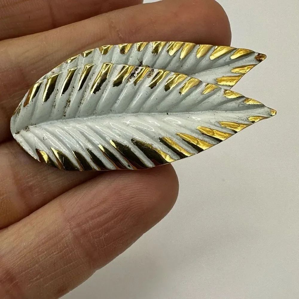 Gold tone and white double leaf vintage brooch